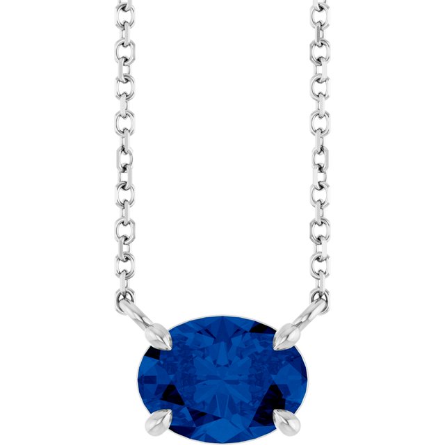 Sterling silver sapphire birthstone necklace with east-west prong setting