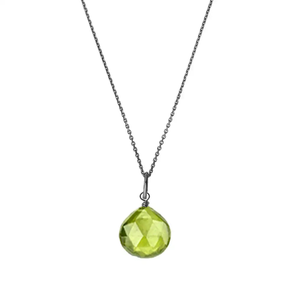 Green peridot necklace contrasted against oxidized silver variant--14K white gold