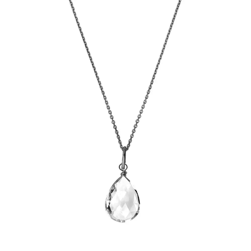 White topaz pendant necklace in oxidized silver with artisan detail