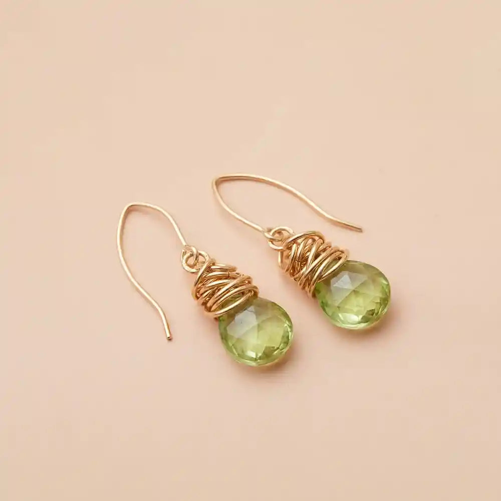 Peridot dangle earrings product shot, genuine lime-green stone in sculptural bezel setting variant--Gold-fill variant--Sterling-silver variant--Peridot
