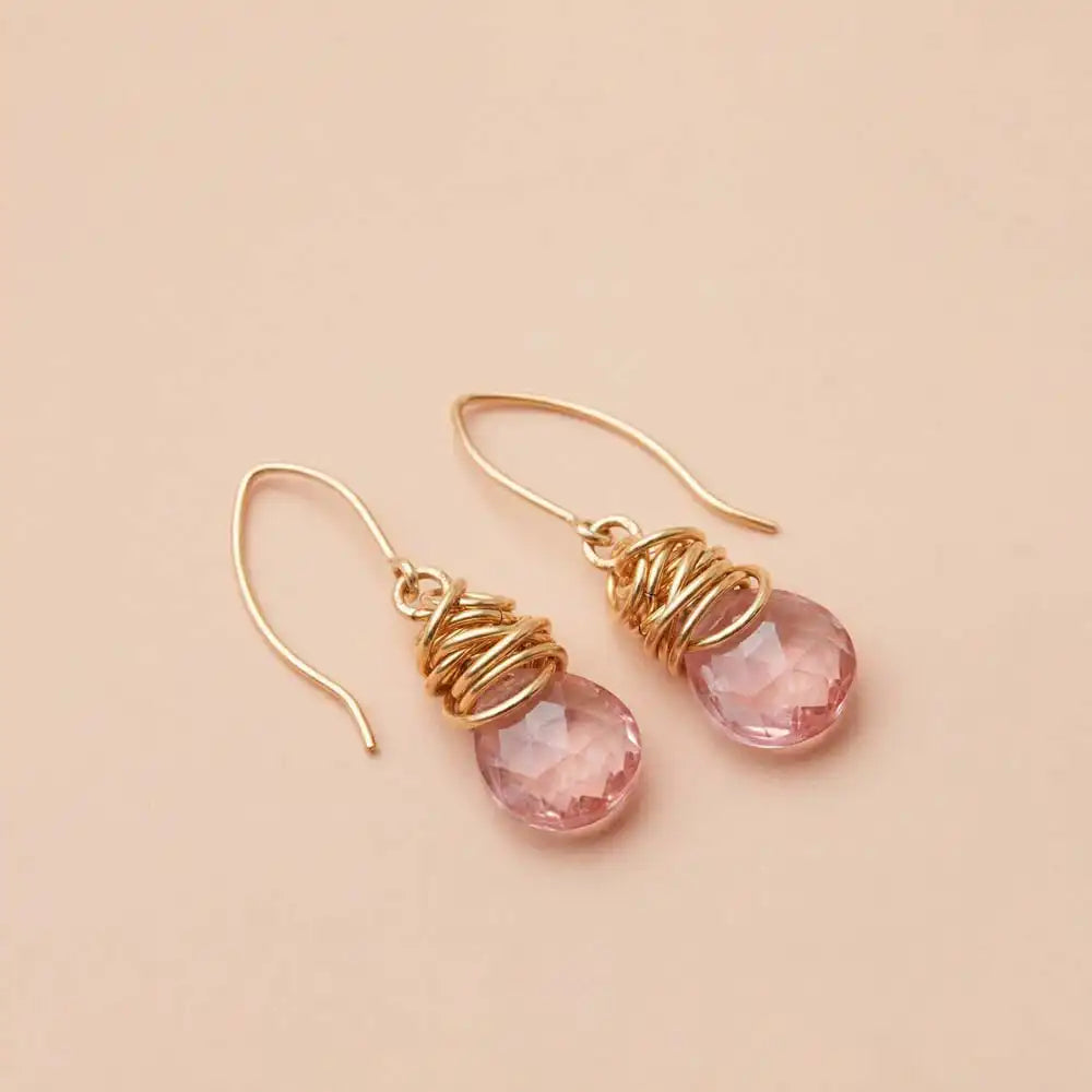 Pink topaz dangle earrings product shot, genuine rosy pink stone in sculptural bezel setting variant--Gold-fill variant--Sterling-silver variant--Pink-Topaz
