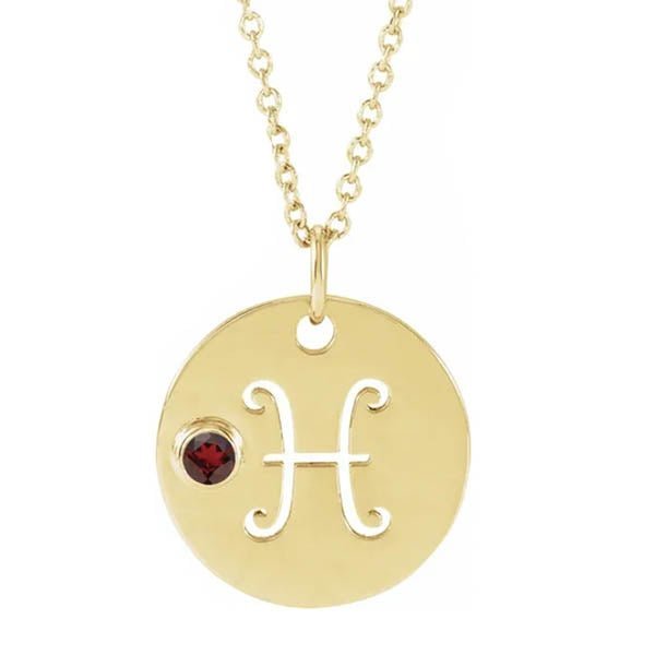 Pisces zodiac medallion in 14K yellow gold with matching birthstone charm detail.