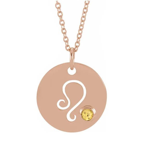 Celestial Leo symbol necklace handcrafted in 14K rose gold with gemstone drop.