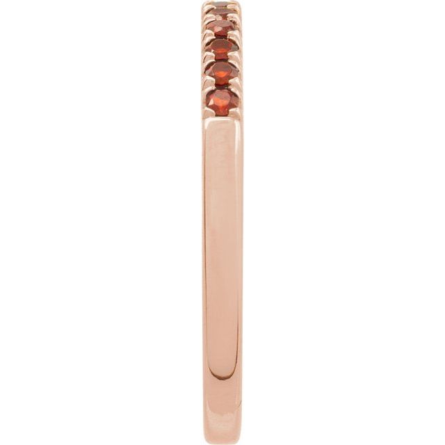 Slim stackable rose gold ring with deep red gems