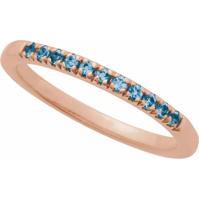 Swiss topaz stacking band in warm 14K rose gold setting