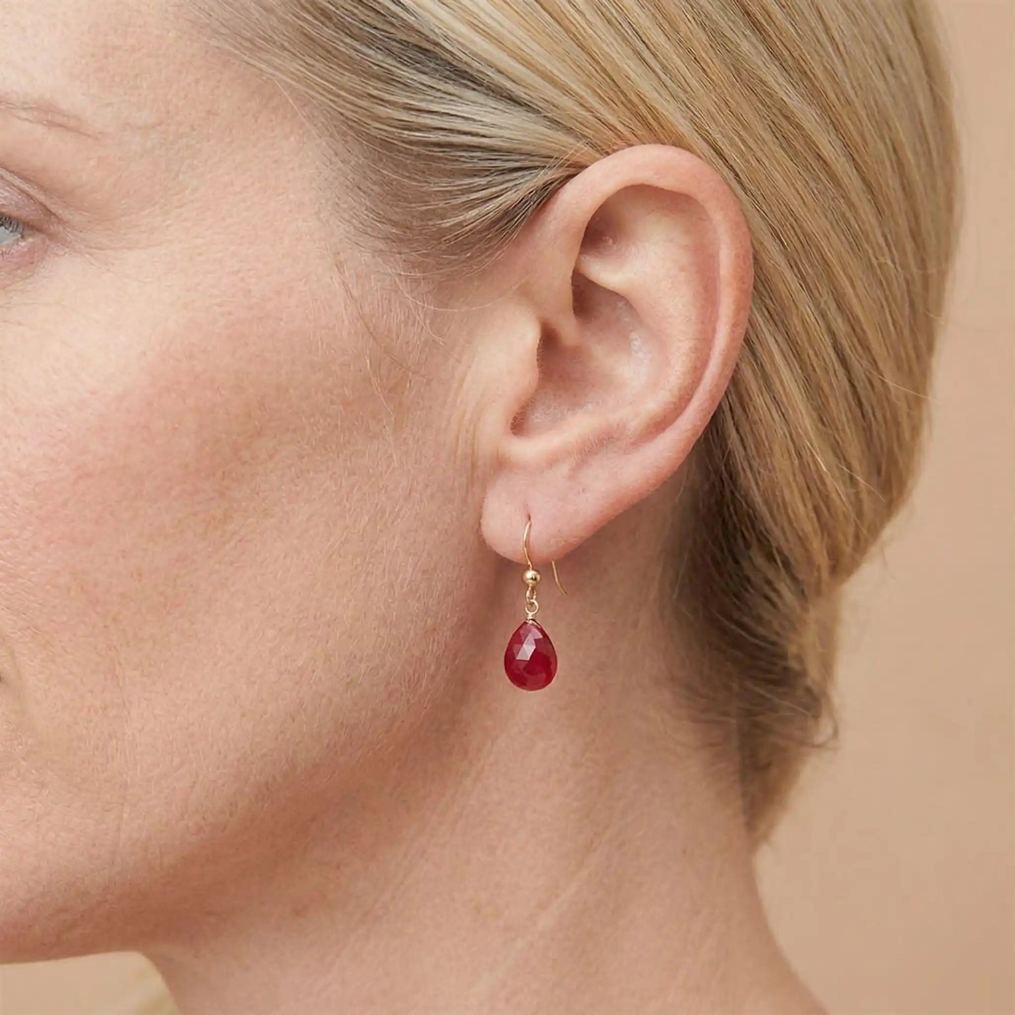 Drop earring in gold-fill shown on model. variant--Gold-fill, variant--Sterling-silver, variant--14K-yellow-gold, variant--14K-white-gold variant--Ruby