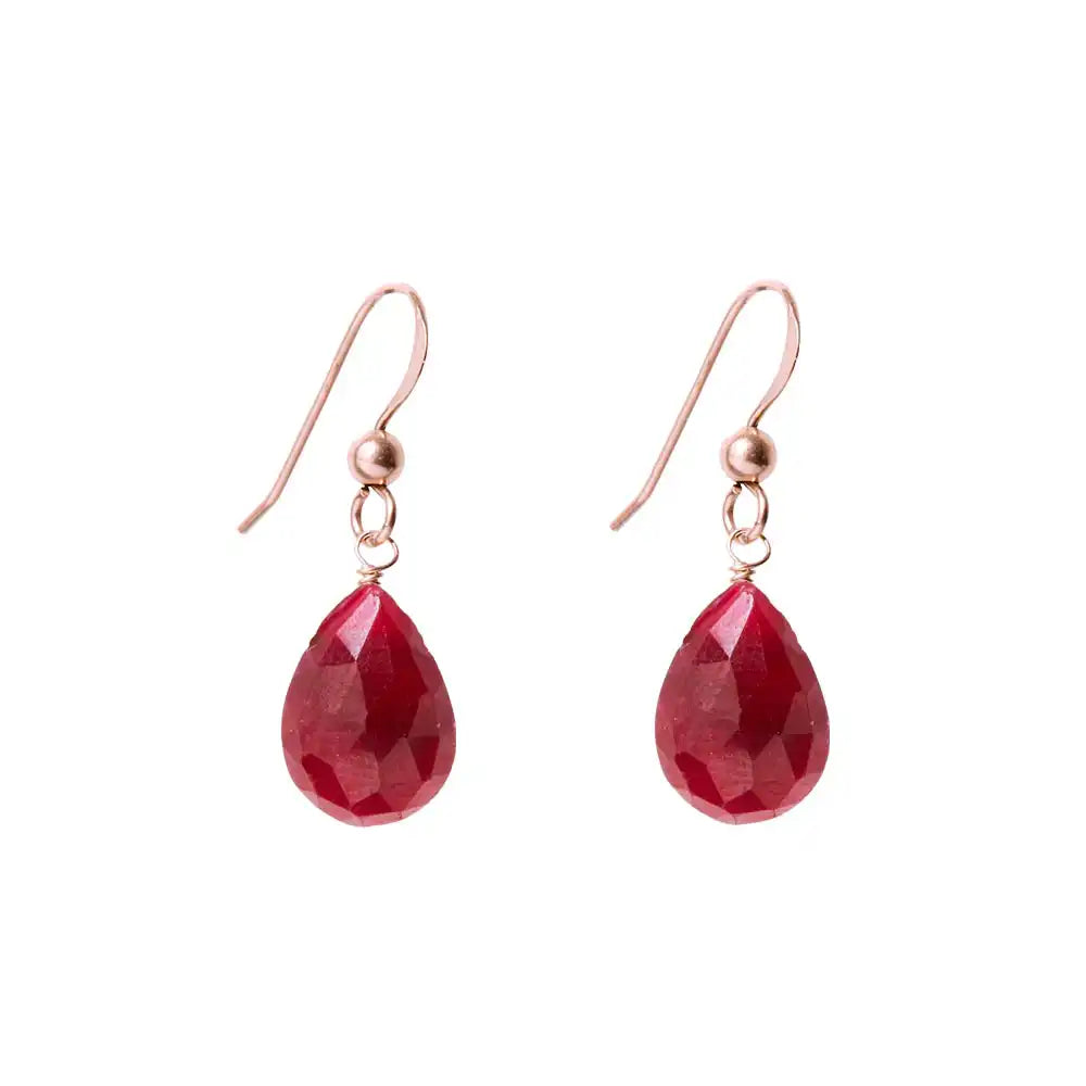 Warm rose gold-fill earrings accented with deep red ruby