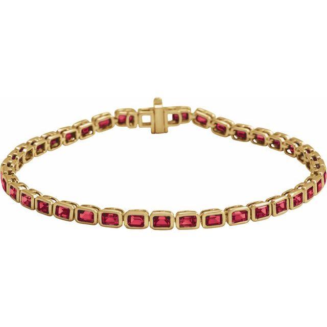 Ruby tennis bracelet 14K gold emerald-cut rubies