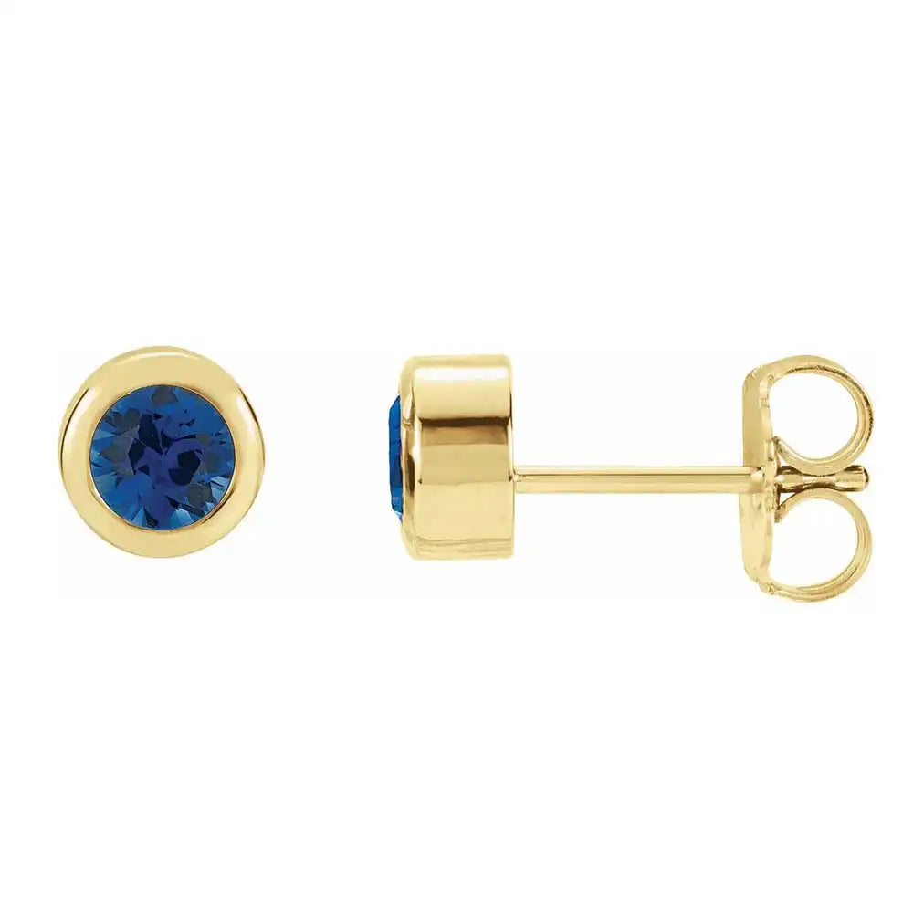 Sapphire bezel stud earrings side view in 14K yellow gold variant--14K-yellow-gold