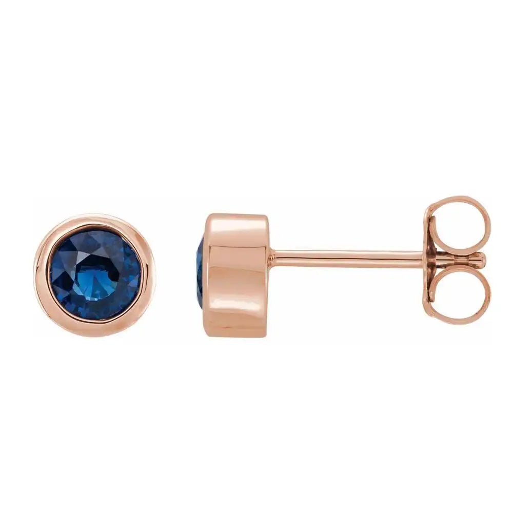 Sapphire bezel stud earrings side view in 14K rose gold