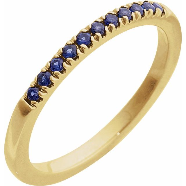 Sapphire stacking ring with deep blue stones in 14K yellow gold