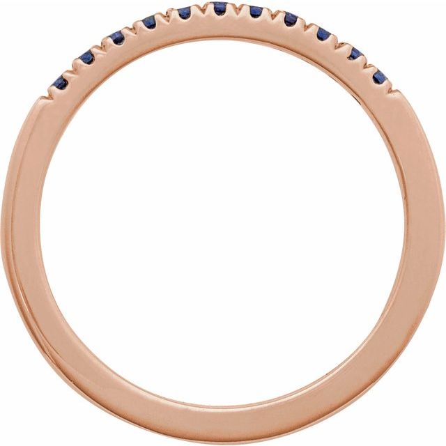 French-set blue sapphires in solid rose gold ring
