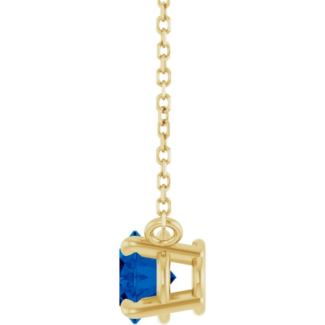 Side View East west sapphire necklace displayed in eco-friendly gift packaging
