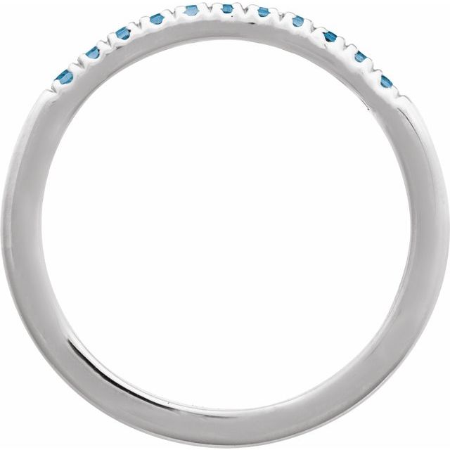 Side profile of Swiss blue topaz ring in white gold setting