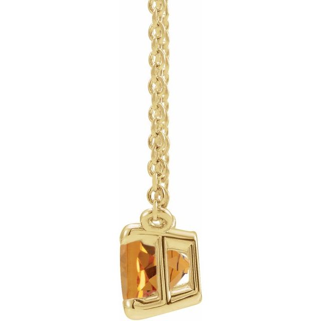 Side angle showing citrine’s glow in prong setting