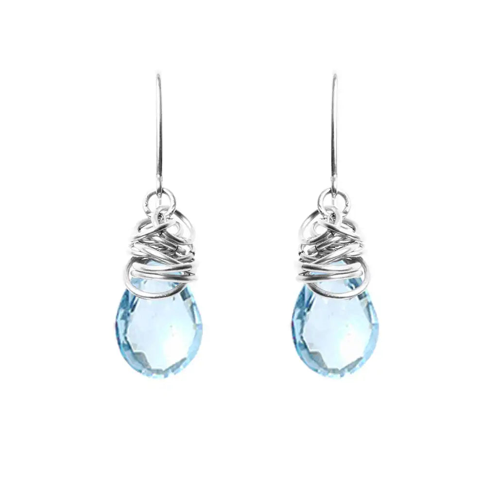 Swiss blue topaz dangle earrings in sterling silver, clean silver bezel setting with warm blue topaz stone variant--Sterling-silver variant--Swiss-Topaz