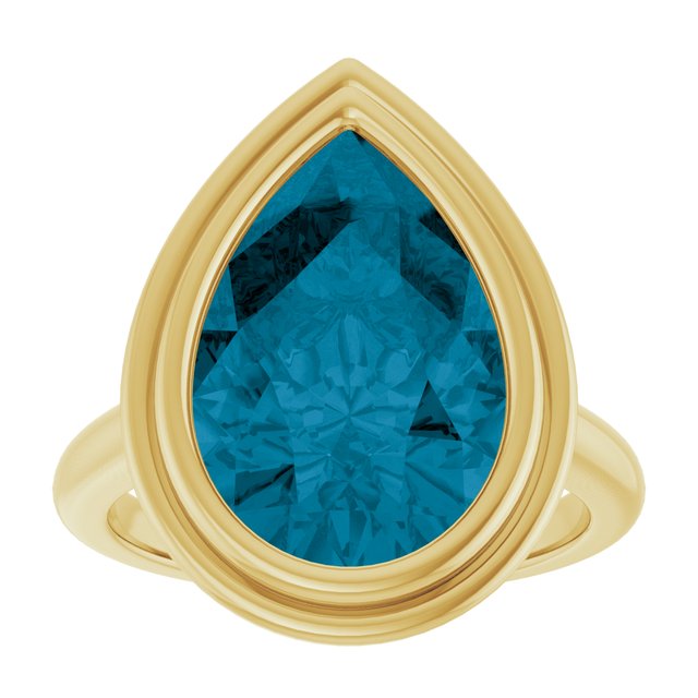 Handmade statement ring with 15x10mm blue topaz in solid yellow gold