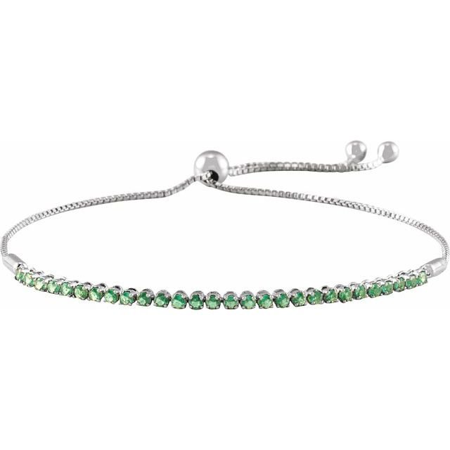 Delicate green emerald bracelet featuring a sliding clasp and minimalist design
