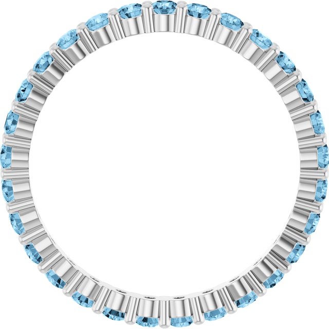 Elegant 10K white gold eternity band with round Swiss Blue Topaz stones, handmade in the USA.