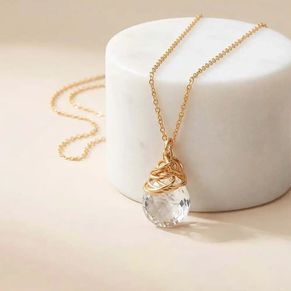 Natural white topaz pendant necklace in sterling silver, styled on chain necklace