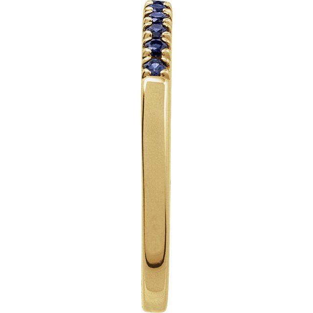Slim yellow gold birthstone band with rich blue sapphires