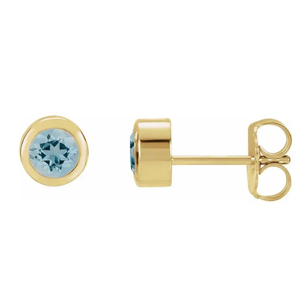 Blue zircon bezel stud earrings side view in 14K yellow gold variant--14K-yellow-gold