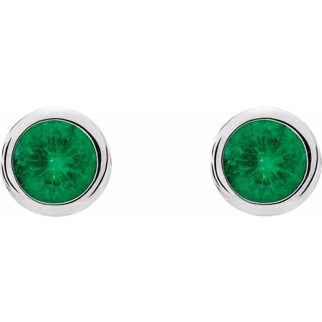Close-up of emerald stud earrings in 14K white gold on white background