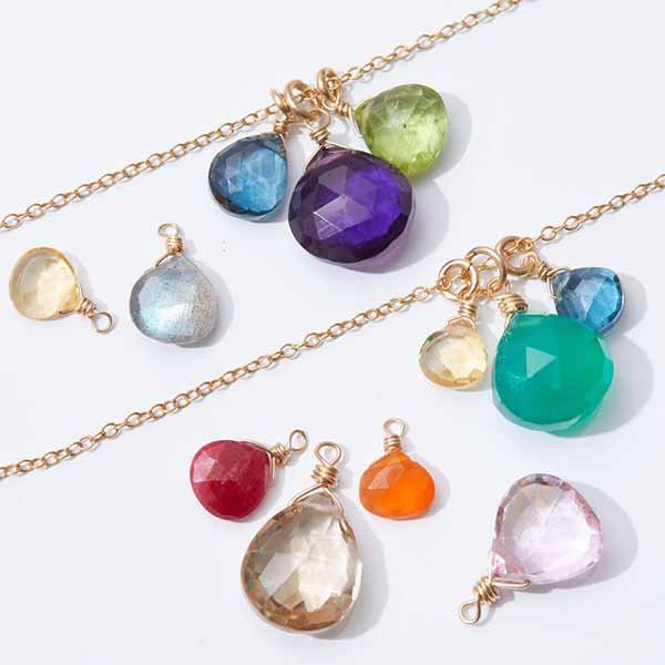 Heirloom-quality gold necklace with custom-selected gems