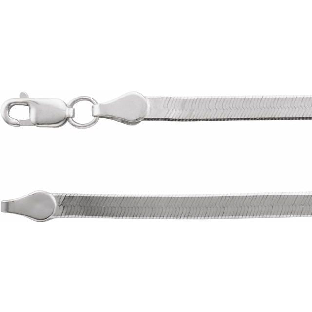 Detail of lobster clasp on solid 14k white gold herringbone necklace.