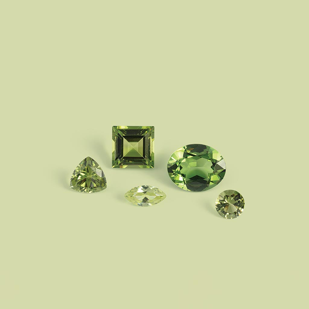 What does peridot symbolize?
