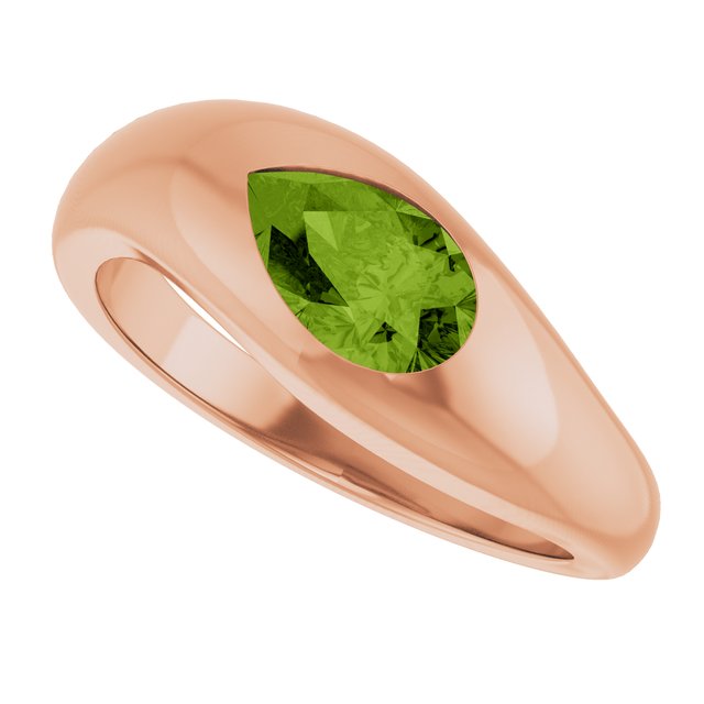 Peridot ring set in rose gold with a pear shape paridot - the perfect cocktail ring