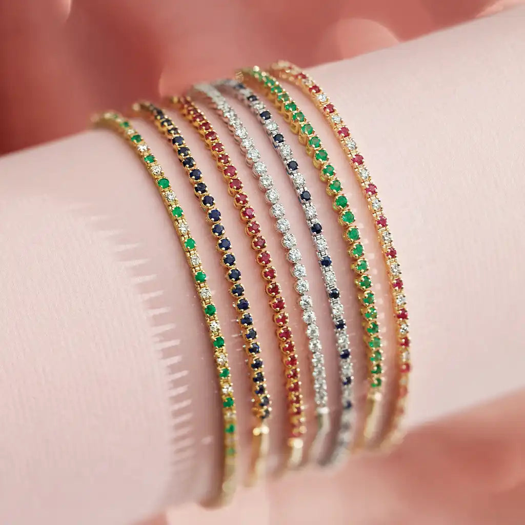 Ruby station bracelet in 14K gold, handcrafted in Colorado