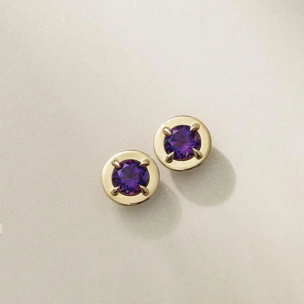 Amethyst stud earrings in 14K gold by Erin Gallagher