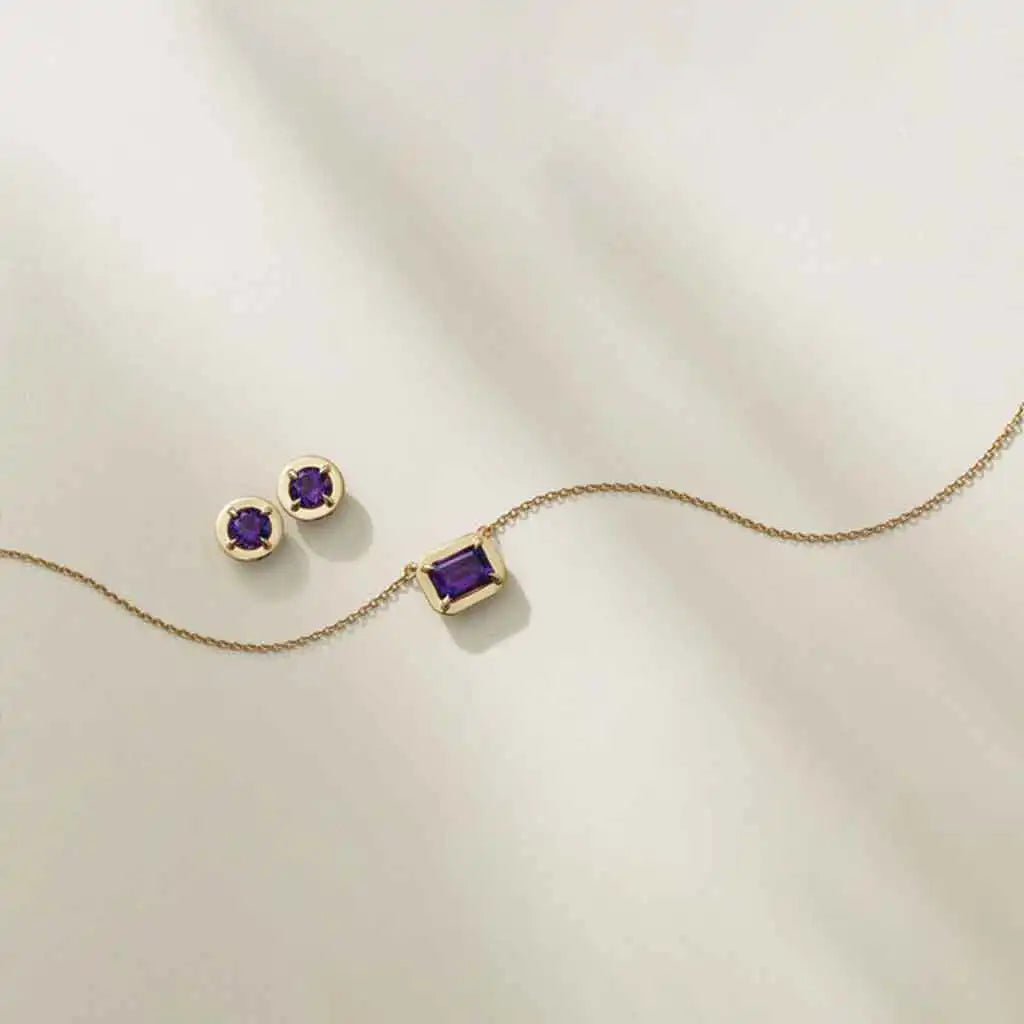 Amethyst jewelry collection in 14K gold and sterling silver by Erin Gallagher
