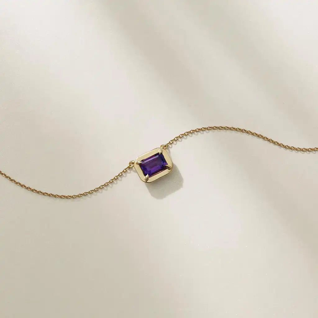 Amethyst birthstone necklace in 14K gold by Erin Gallagher