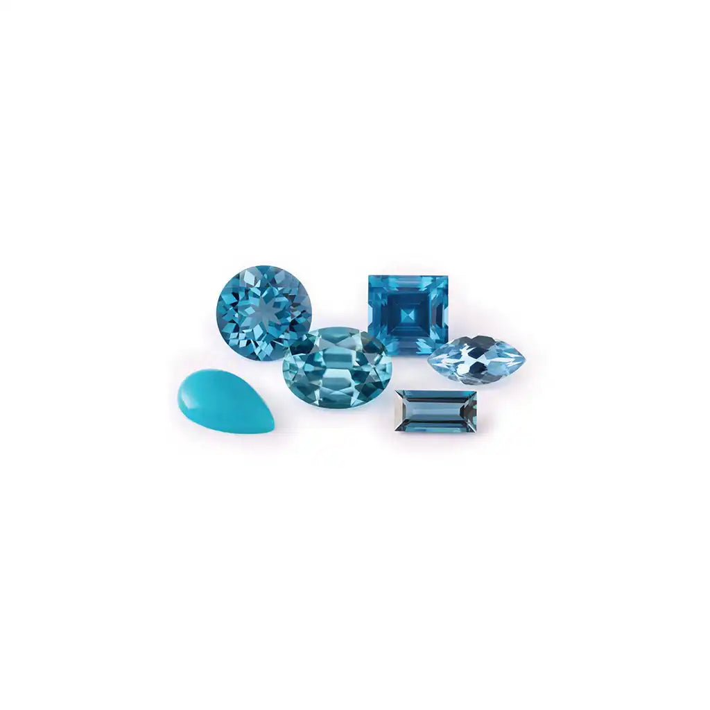 December birthstone jewelry featuring Swiss blue topaz in 14K gold