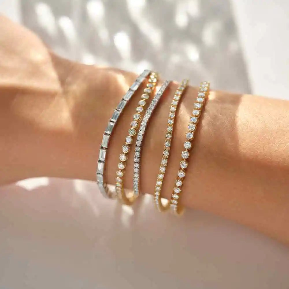 Stackable diamond tennis bracelets in recycled gold and silver