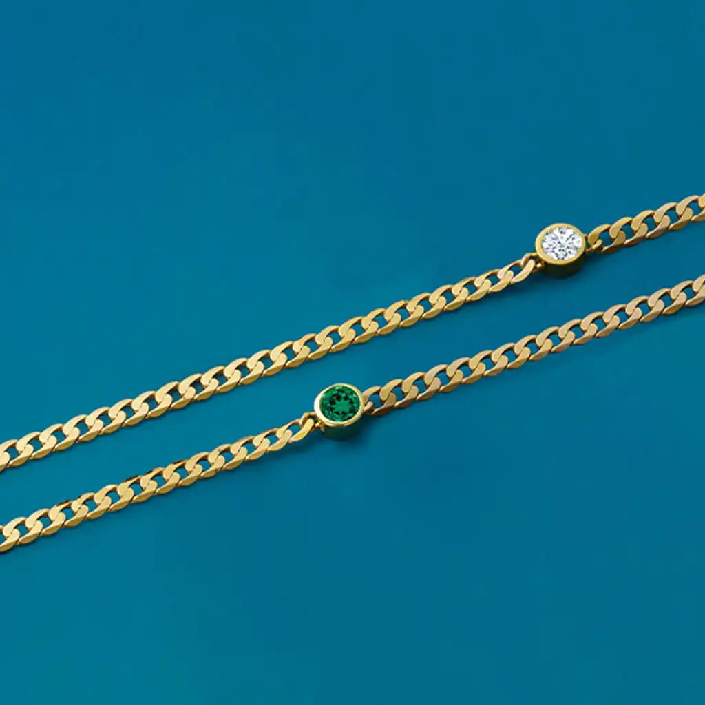 Emerald Tennis Bracelet in 14k yellow gold handmade by Erin Gallagher in CO