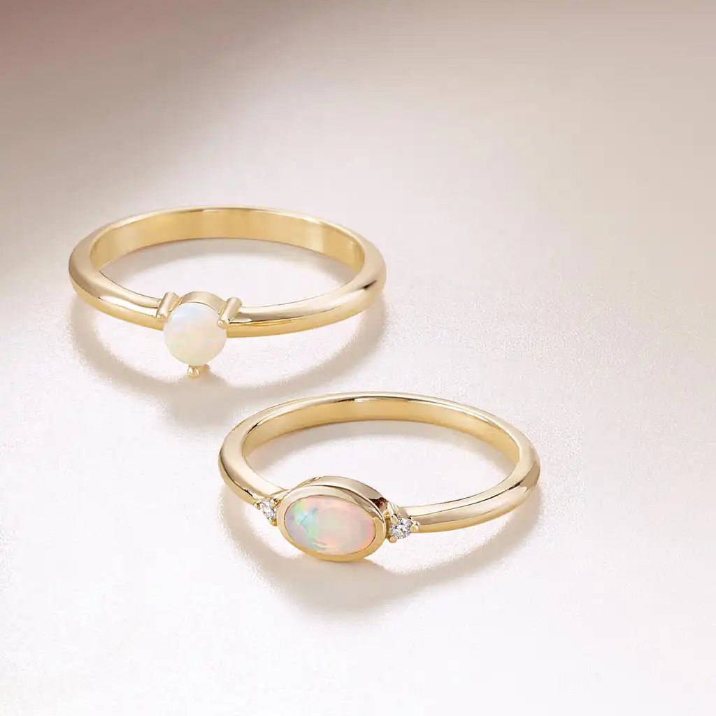 Opal ring bezel-set in 14K yellow gold, handcrafted in Colorado