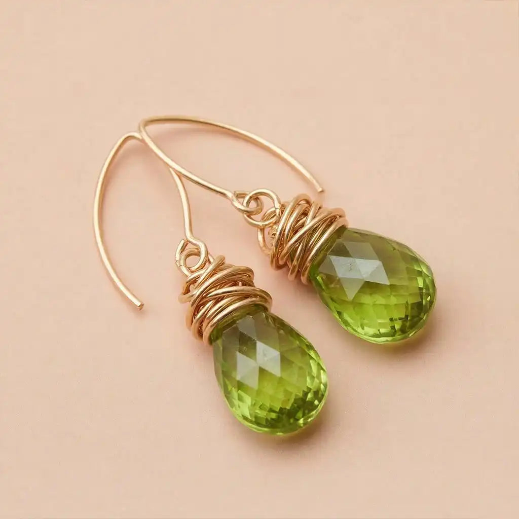 Peridot drop earrings in 14K gold, handcrafted in Colorado