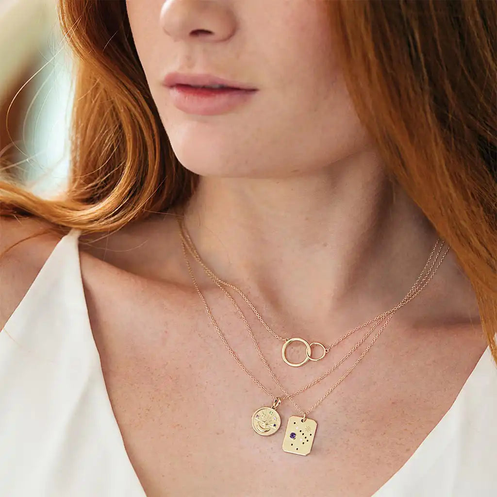 Sagittarius medallion pendant in gold