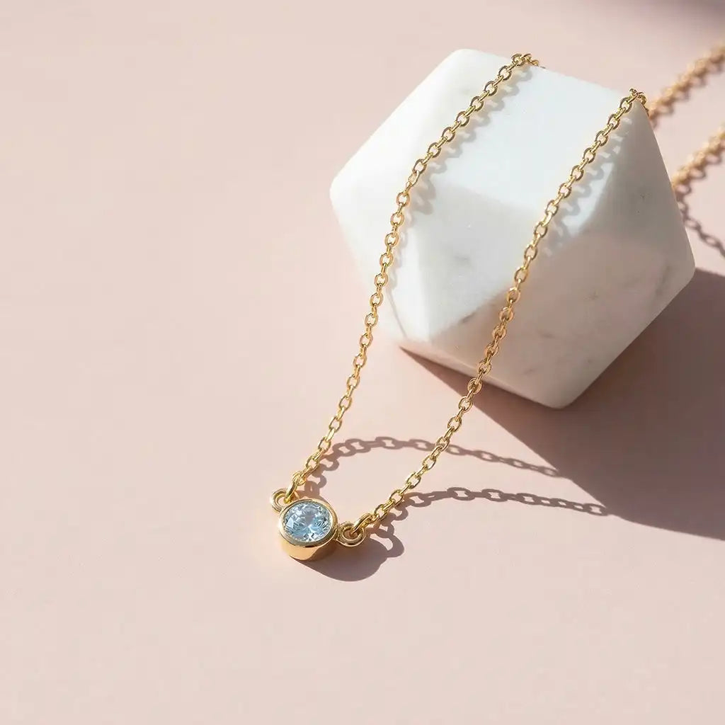 Natural zircon pendant necklace in 14K gold, handcrafted in Colorado