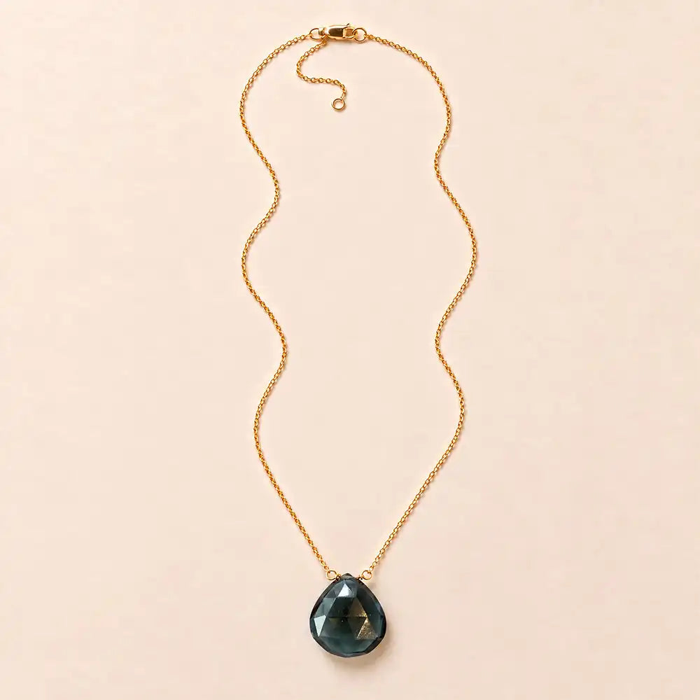 London Blue Topaz long pendant necklace, hand-cut briolette on an adjustable rolo chain, flat lay