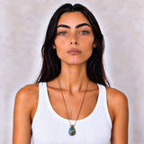 Labradorite long pendant necklace worn at the full 24 inch length on model
