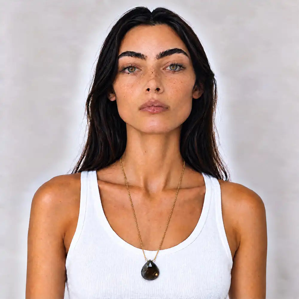 Smokey Topaz long pendant necklace worn at the full 24 inch length on model