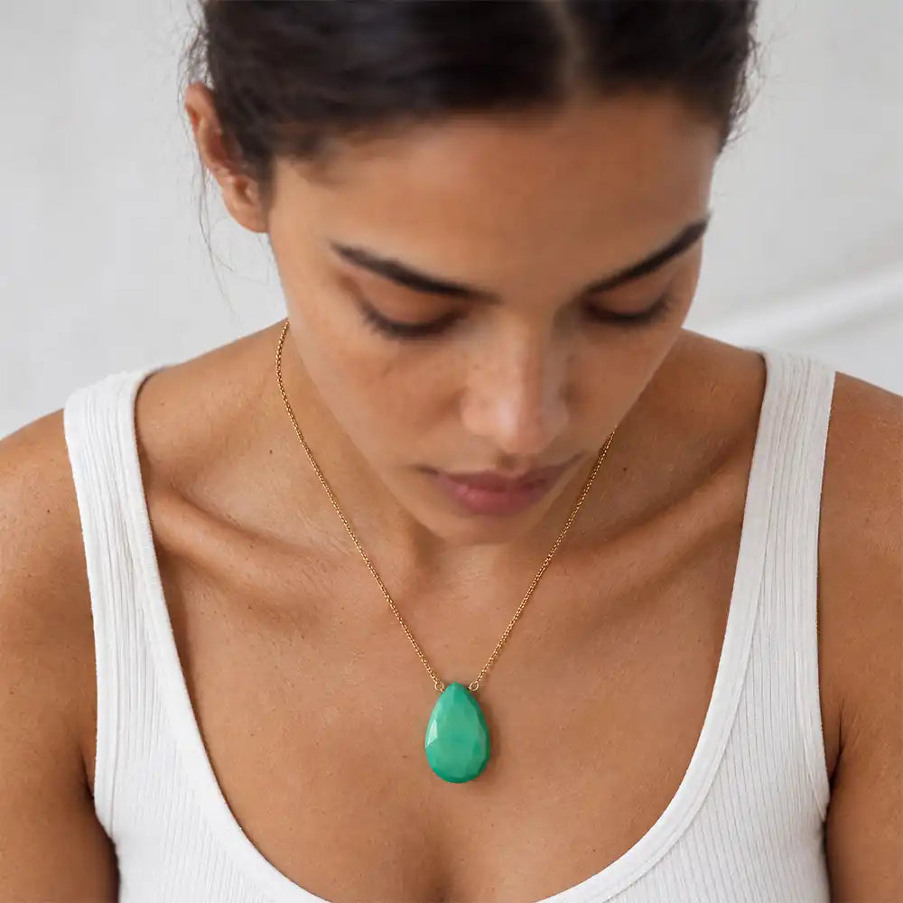 Chrysoprase long pendant necklace on model, close view of the briolette pendant