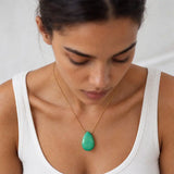 Chrysoprase long pendant necklace on model, close view of the briolette pendant