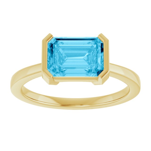 Gemmy tile cocktail ring with peridot emerald-cut stone in rose gold