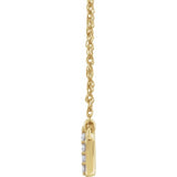 Side view of Diamond lowercase initial necklace in 14K yellow gold