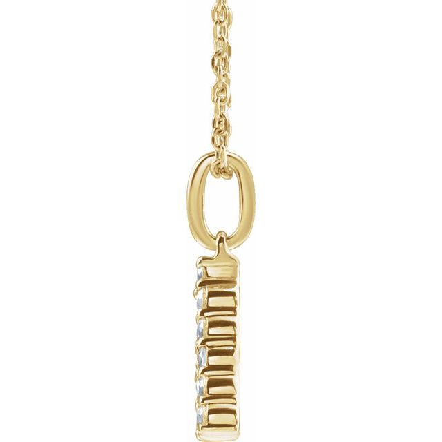 Side view of Diamond letter necklace in 14K yellow gold